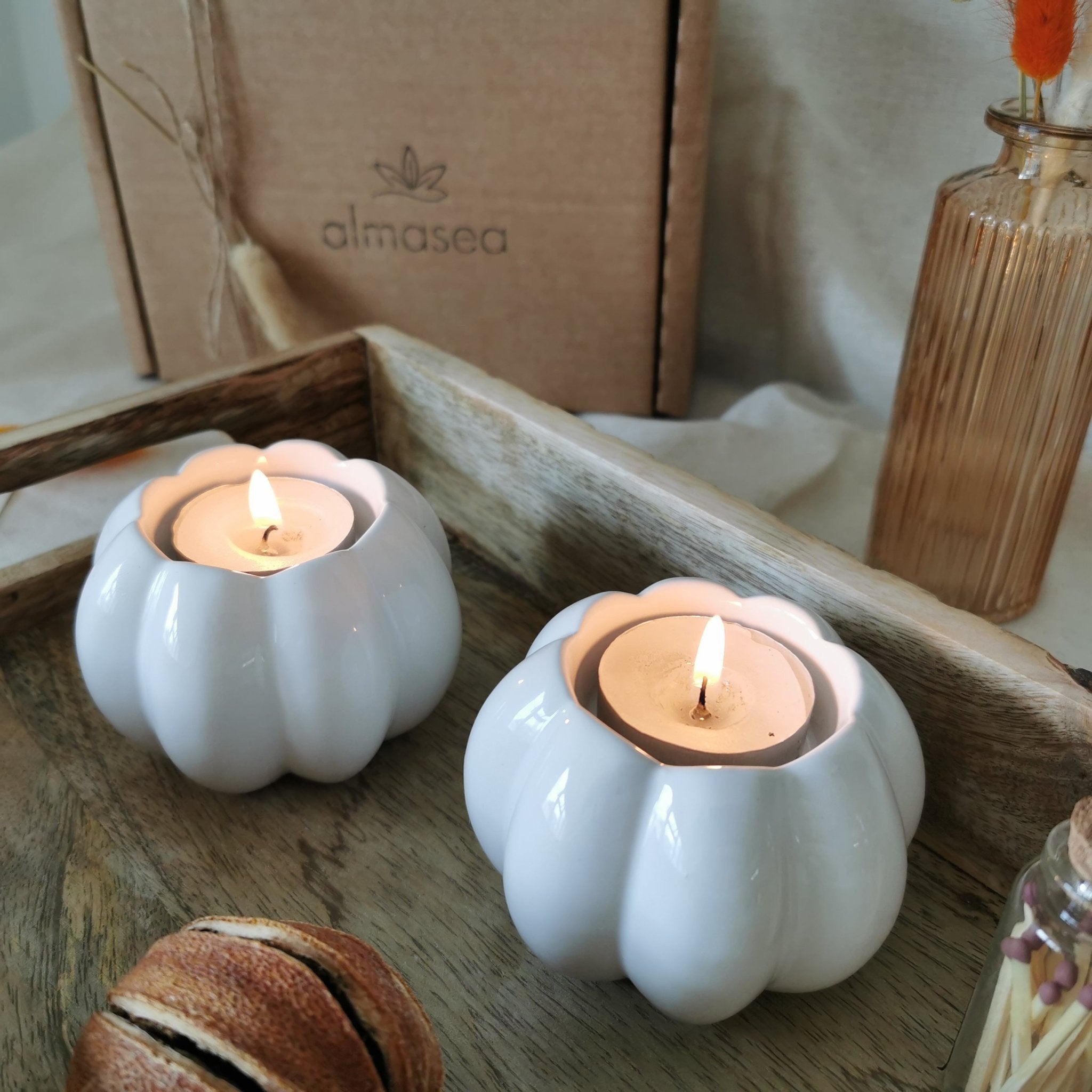 Set of two ceramic pumpkin tea light holders and matches