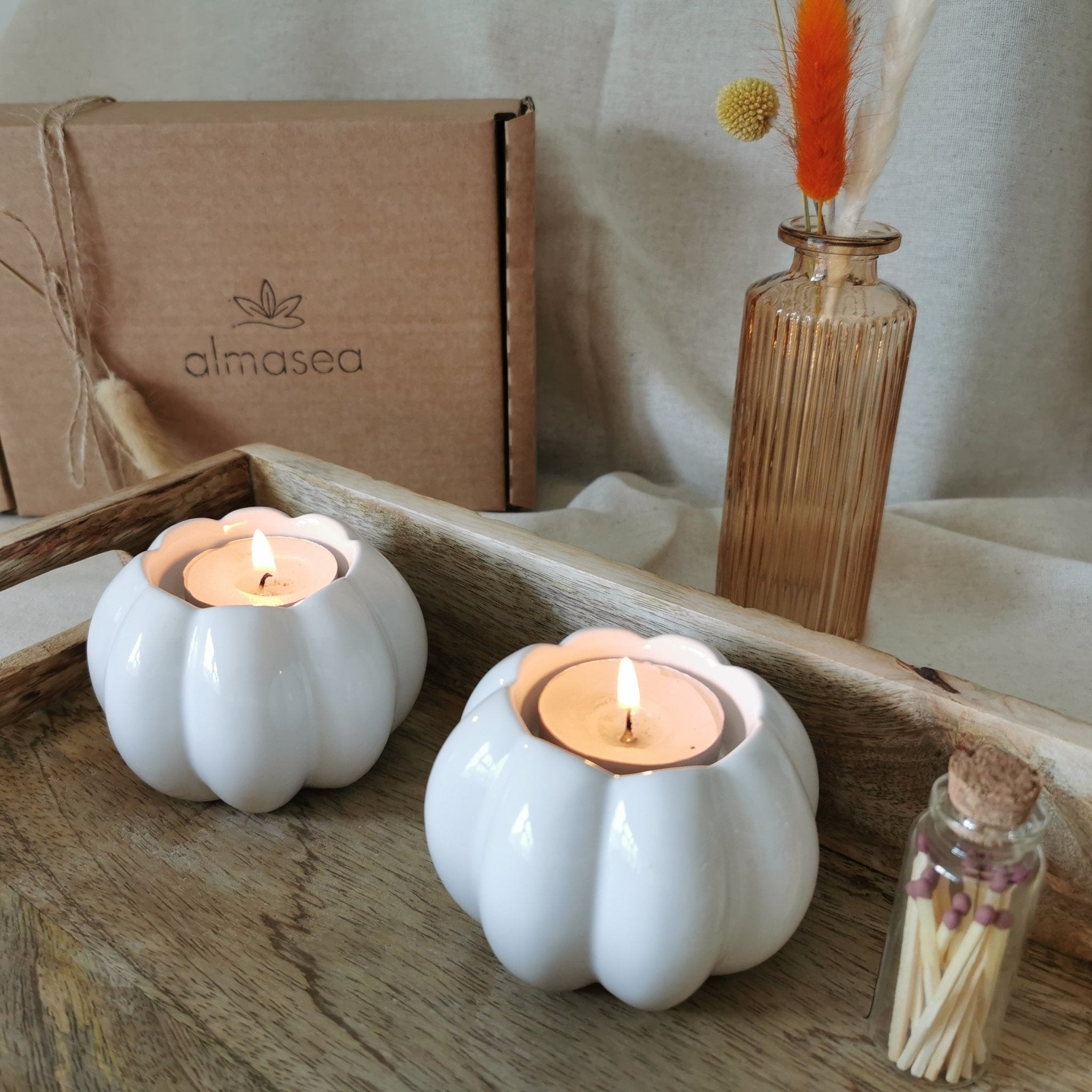 Set of two ceramic pumpkin tea light holders and matches